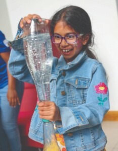 Kumudu Morawaka aged 9 creates a vortex at the Intel Science Discovery Showcase