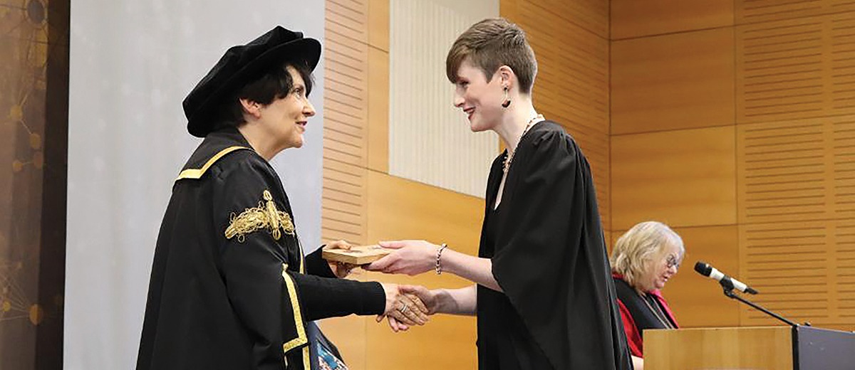 UCD President Prof. Orla Feely with Ciara Douglas, UCD Archery