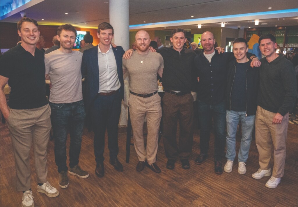 Alumni and players from UCD’s 2016 Sigerson Cup-winning Gaelic football team, alongside manager John Divilly (third from right).