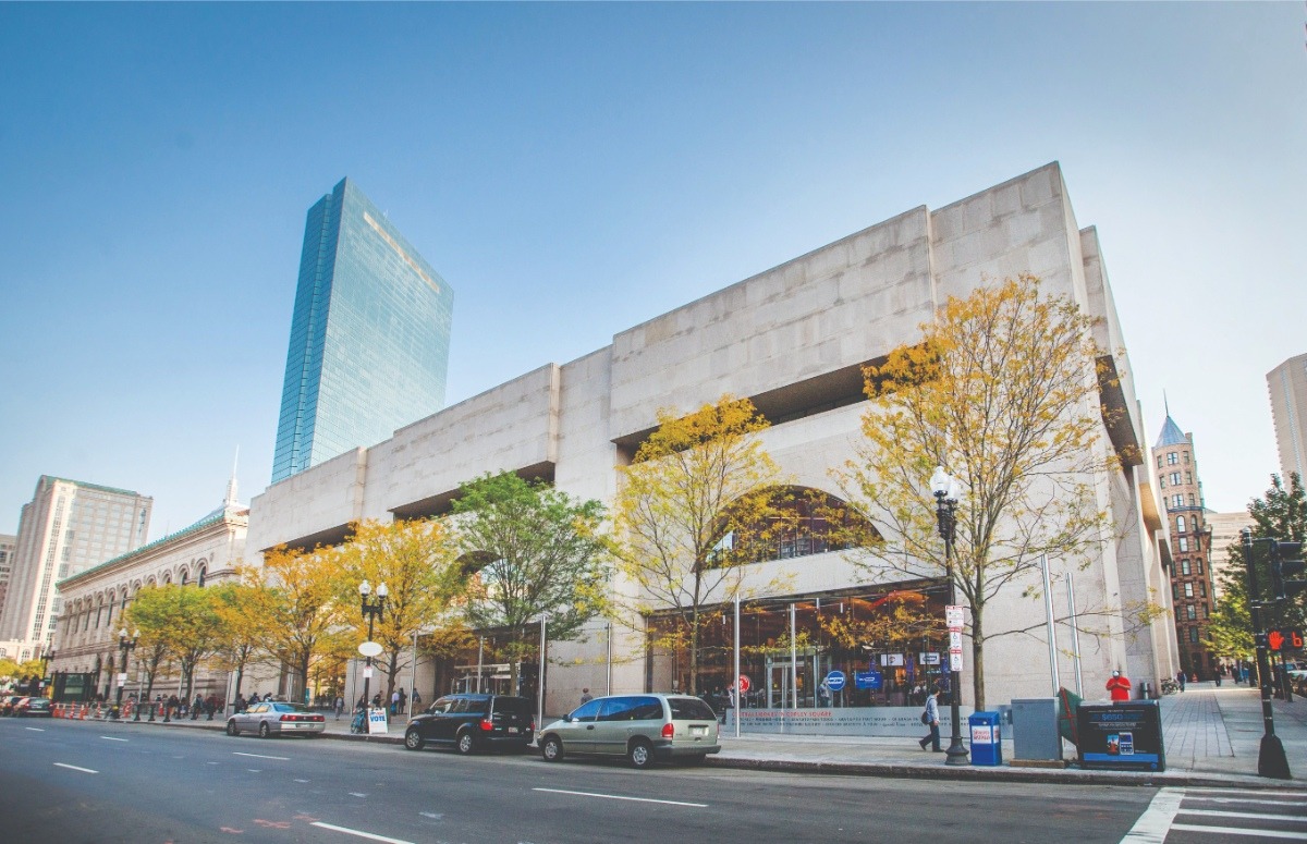 The recently renovated facade of the brutalist Boylston Street Building contrasts with the older McKim Building to the left hand side.
