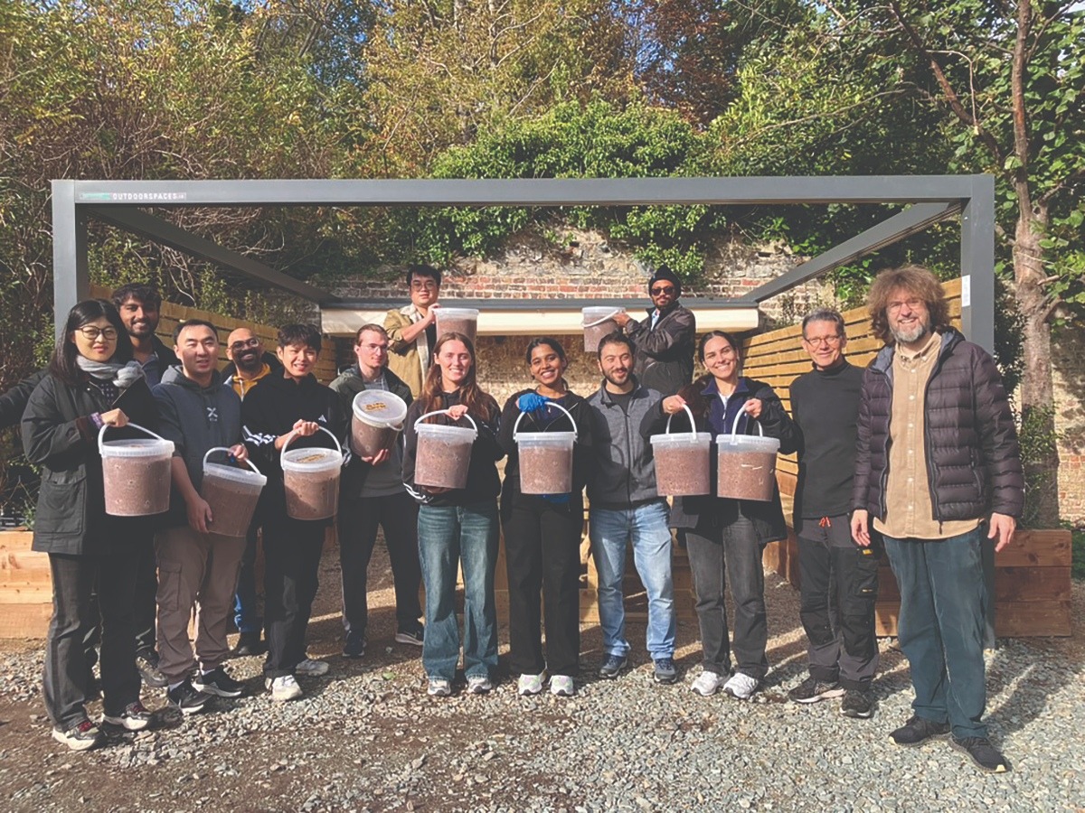 Dr Dimitrios Argyropoulos (right) and Dr Thomas Macagno (second to right) with mushroom project team members.