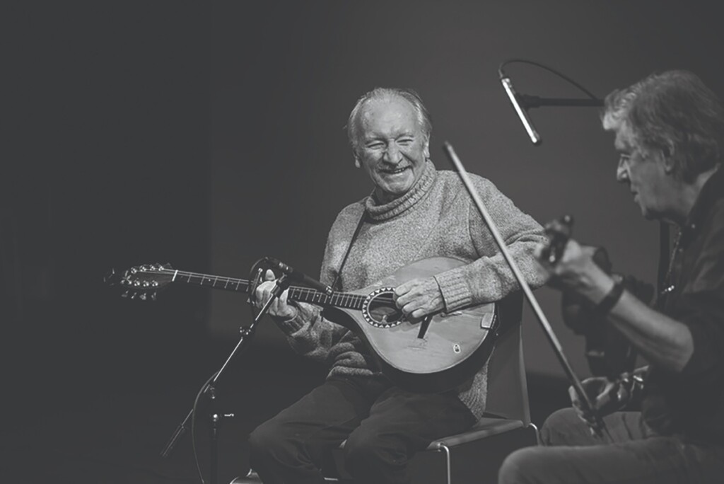 2. Dónal Lunny performing with Paddy Glackin.